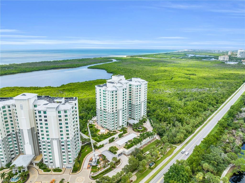 265 Indies Way, Unit 1404 Naples, FL 34110 - Photo 3 of 42 Aerial view with a water view