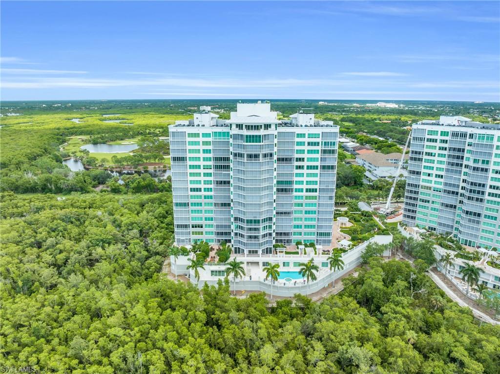265 Indies Way, Unit 1404 Naples, FL 34110 - Photo 38 of 42 Bird's eye view featuring a water view
