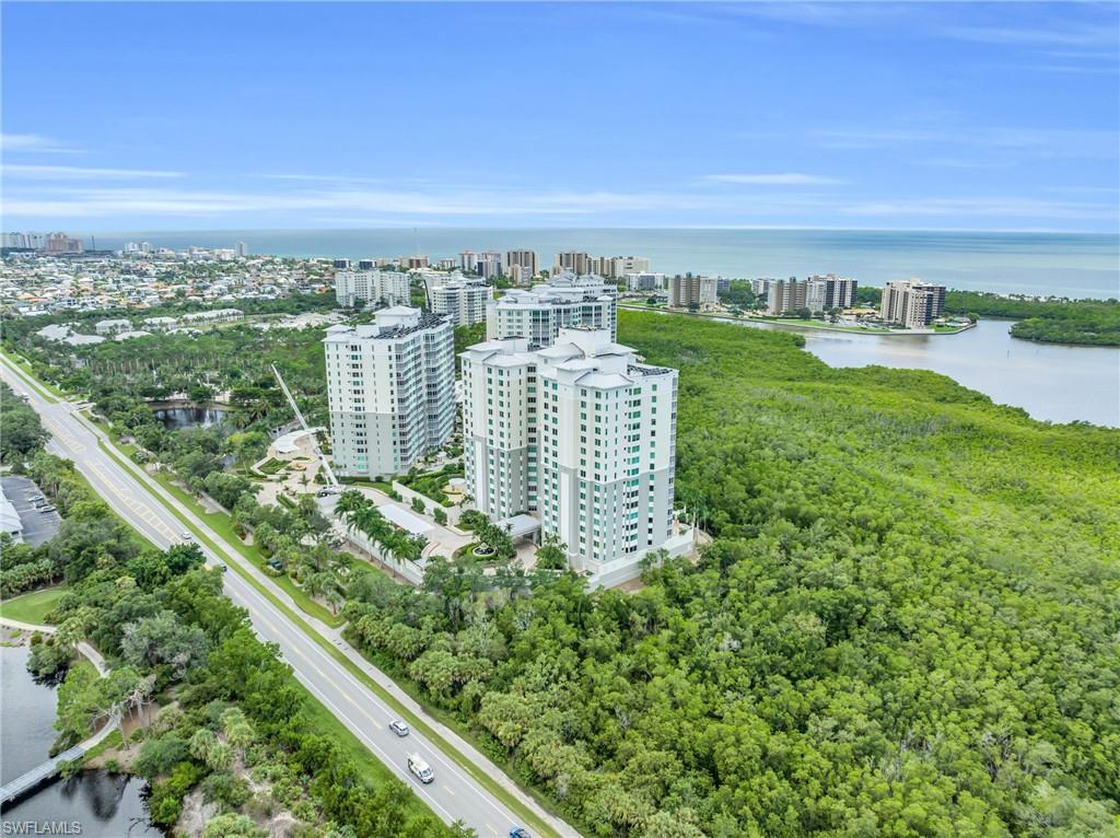 265 Indies Way, Unit 1404 Naples, FL 34110 - Photo 41 of 42 Birds eye view of property featuring a water view