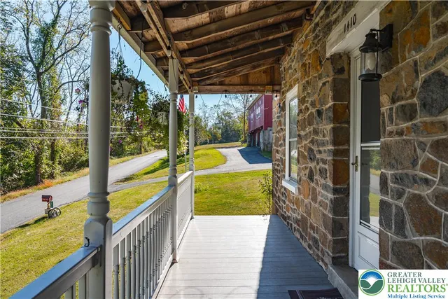 a front view of a house with swimming pool