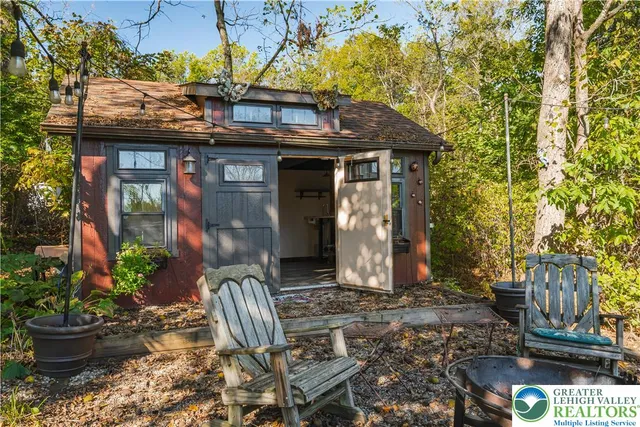 a picture of a bathroom with a shower