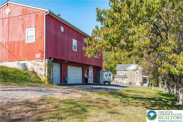 a view of a yard with swimming pool