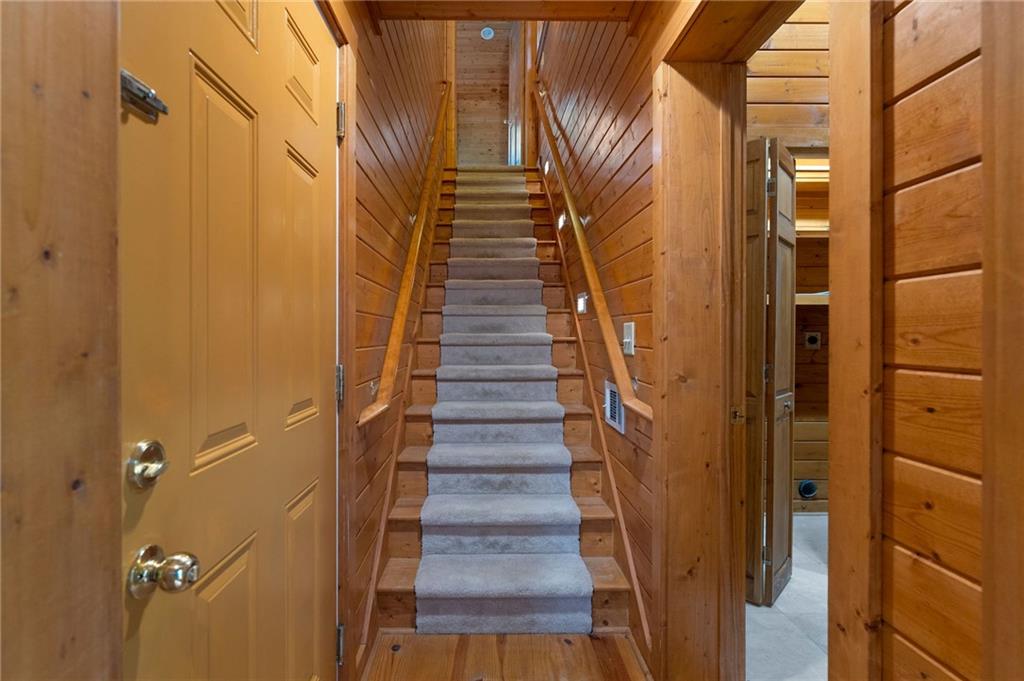 442 Cartecay River Run Ellijay, GA 30536 - Photo 27 of 63 a view of a hallway with wooden floor and entryway