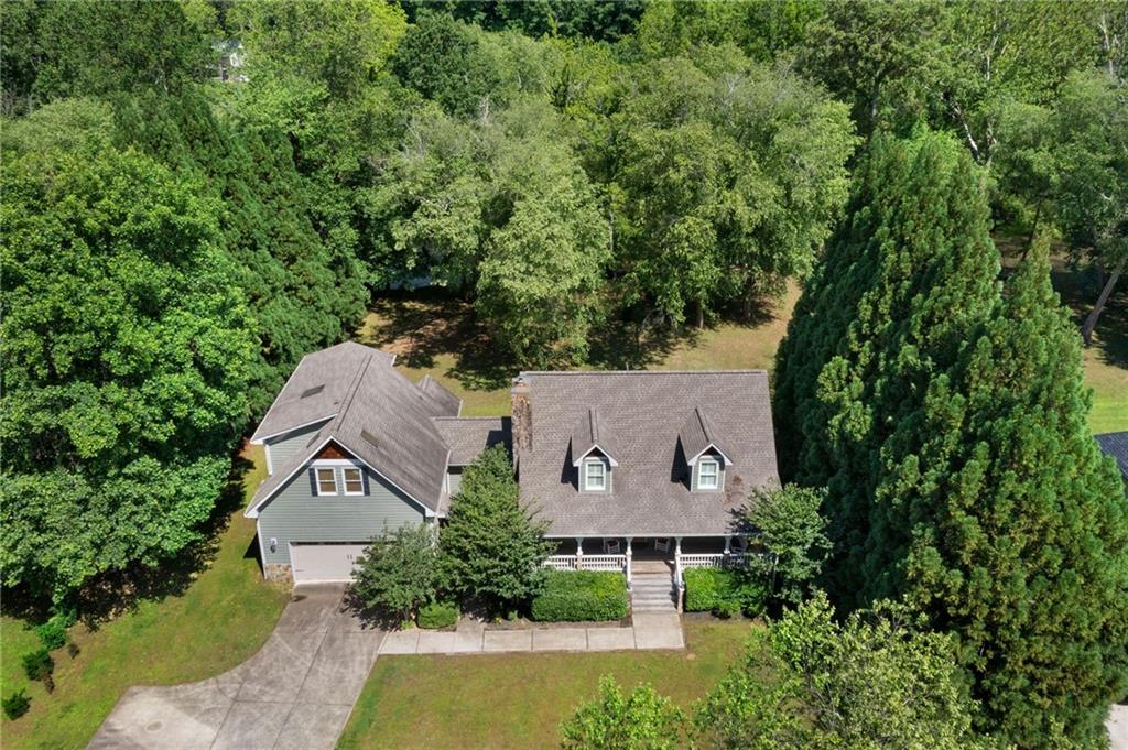 442 Cartecay River Run Ellijay, GA 30536 - Photo 3 of 63 an aerial view of a house with a yard and trees all around