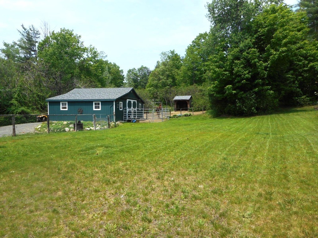 200 West Orange Road Orange, MA 01364 - Photo 11 of 24 a front view of a house with garden