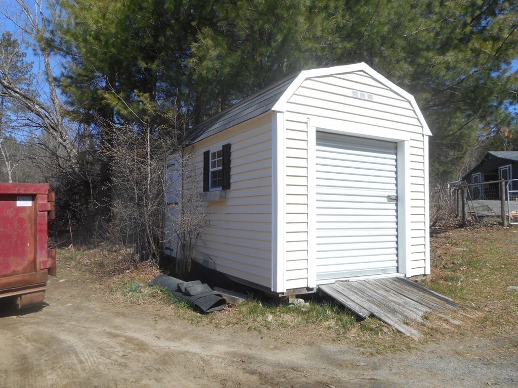 200 West Orange Road Orange, MA 01364 - Photo 14 of 24 a view of a house with a yard