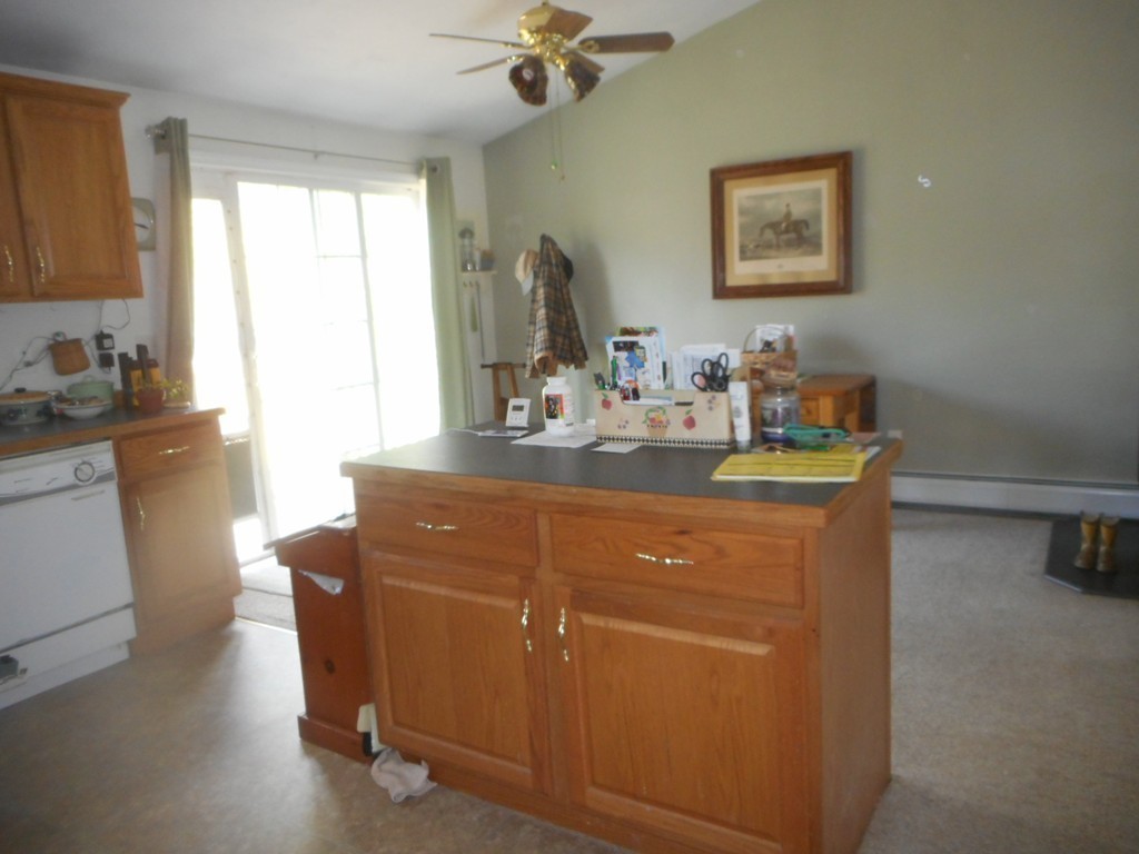 200 West Orange Road Orange, MA 01364 - Photo 20 of 24 a room with a sink cabinets and a window