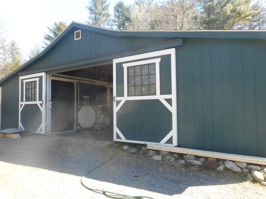 200 West Orange Road Orange, MA 01364 - Photo 3 of 24 a backyard of a house with seating space