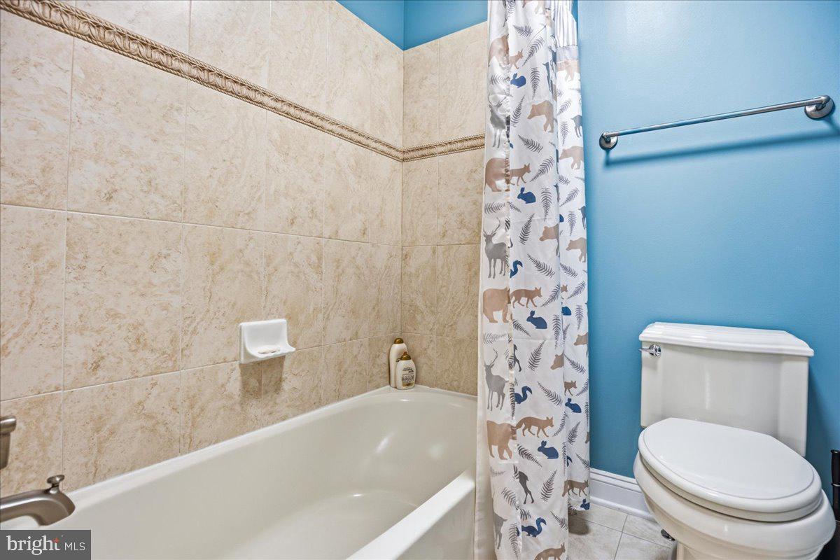 4100 Hidden Creek Road Port Republic, MD 20676 - Photo 67 of 99 Tiled surround and flooring