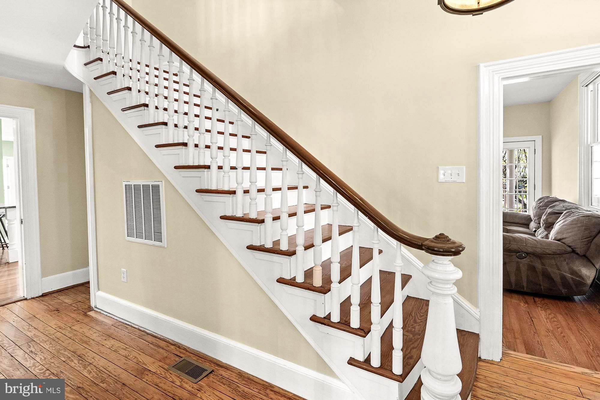 17811 Elgin Road Poolesville, MD 20837 - Photo 26 of 91 Majestic staircase leading to the second floor