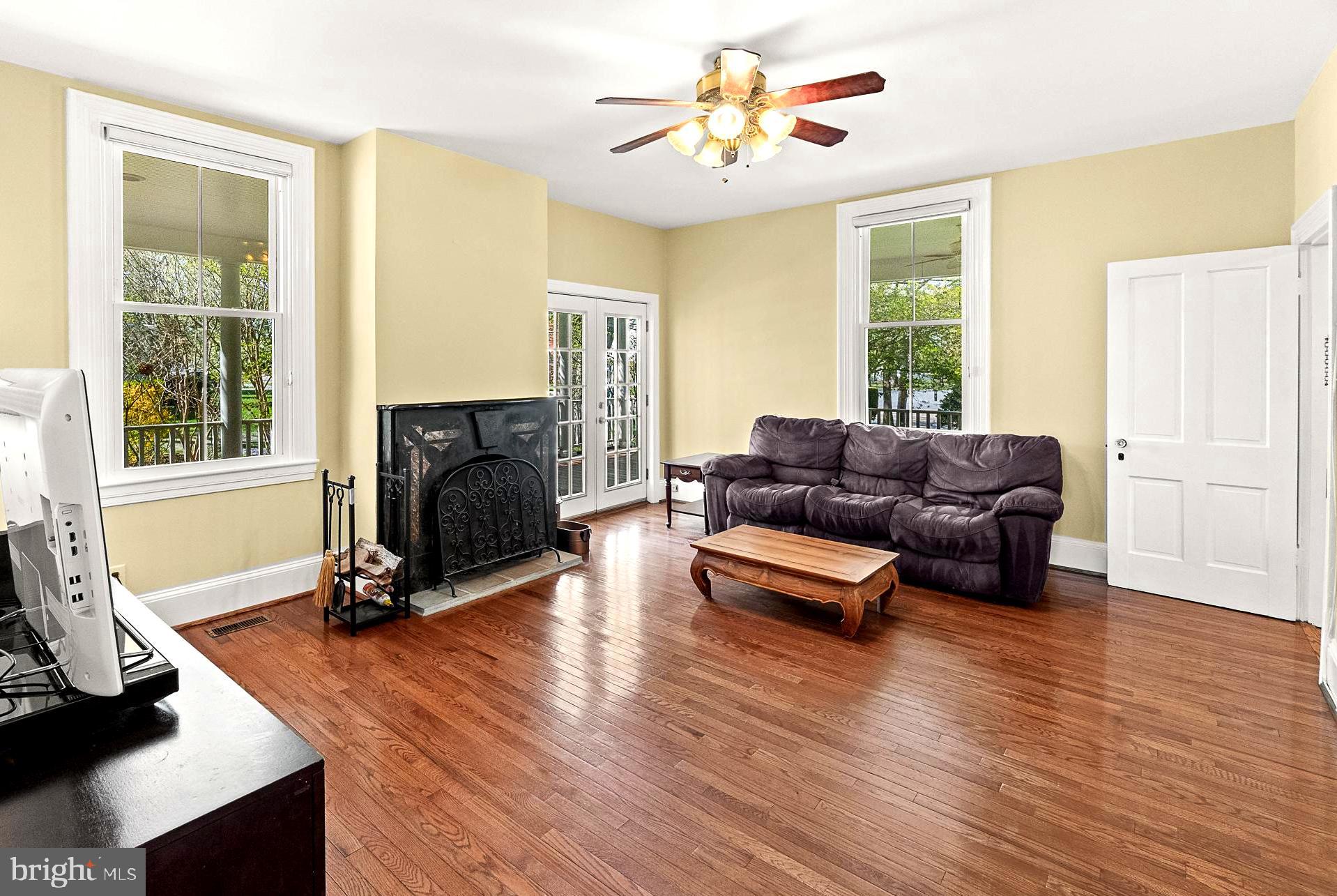 17811 Elgin Road Poolesville, MD 20837 - Photo 29 of 91 Gorgeous family room w/tall ceilings and fireplace