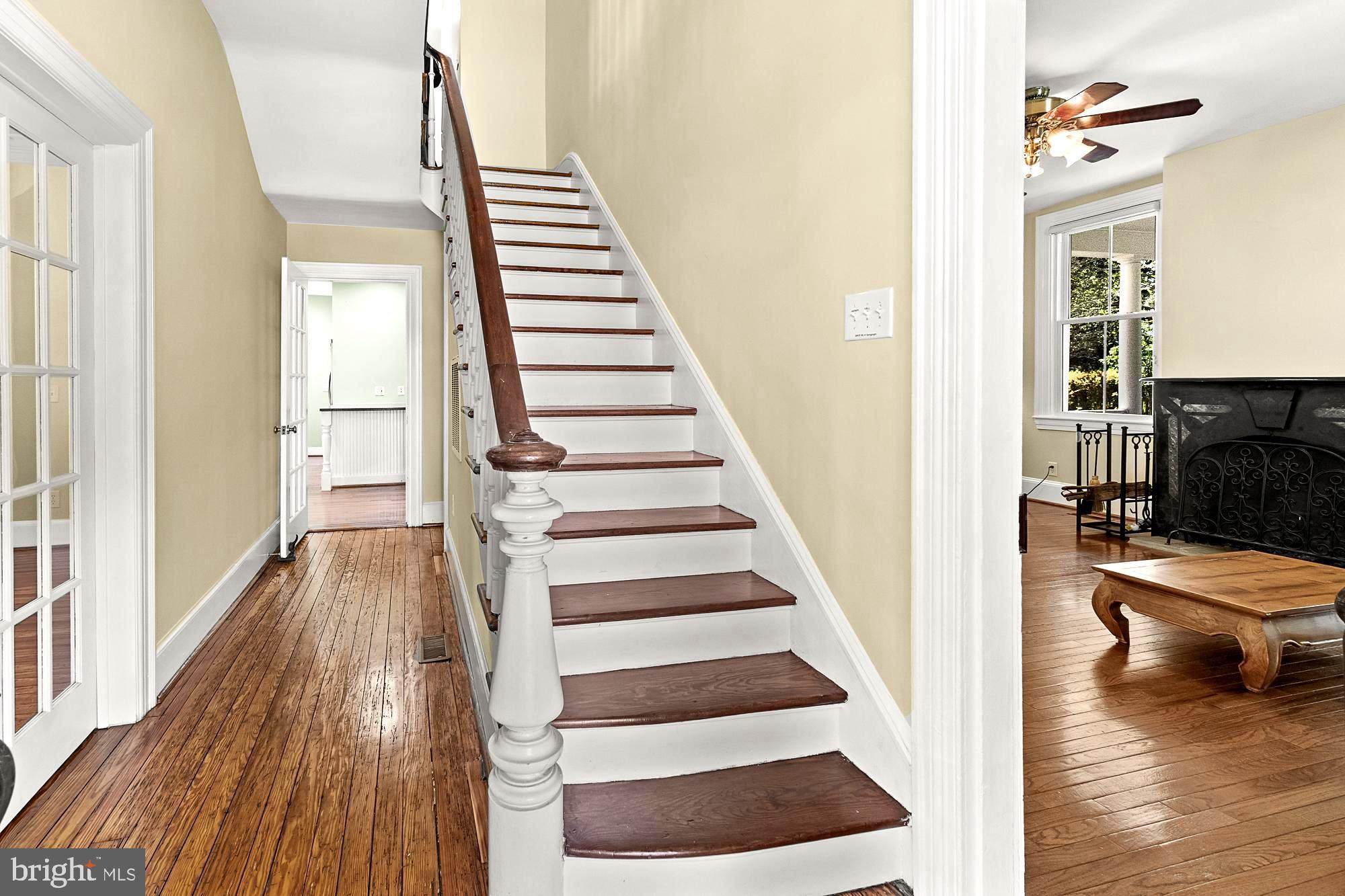 17811 Elgin Road Poolesville, MD 20837 - Photo 52 of 91 Center hall staircase going to second level