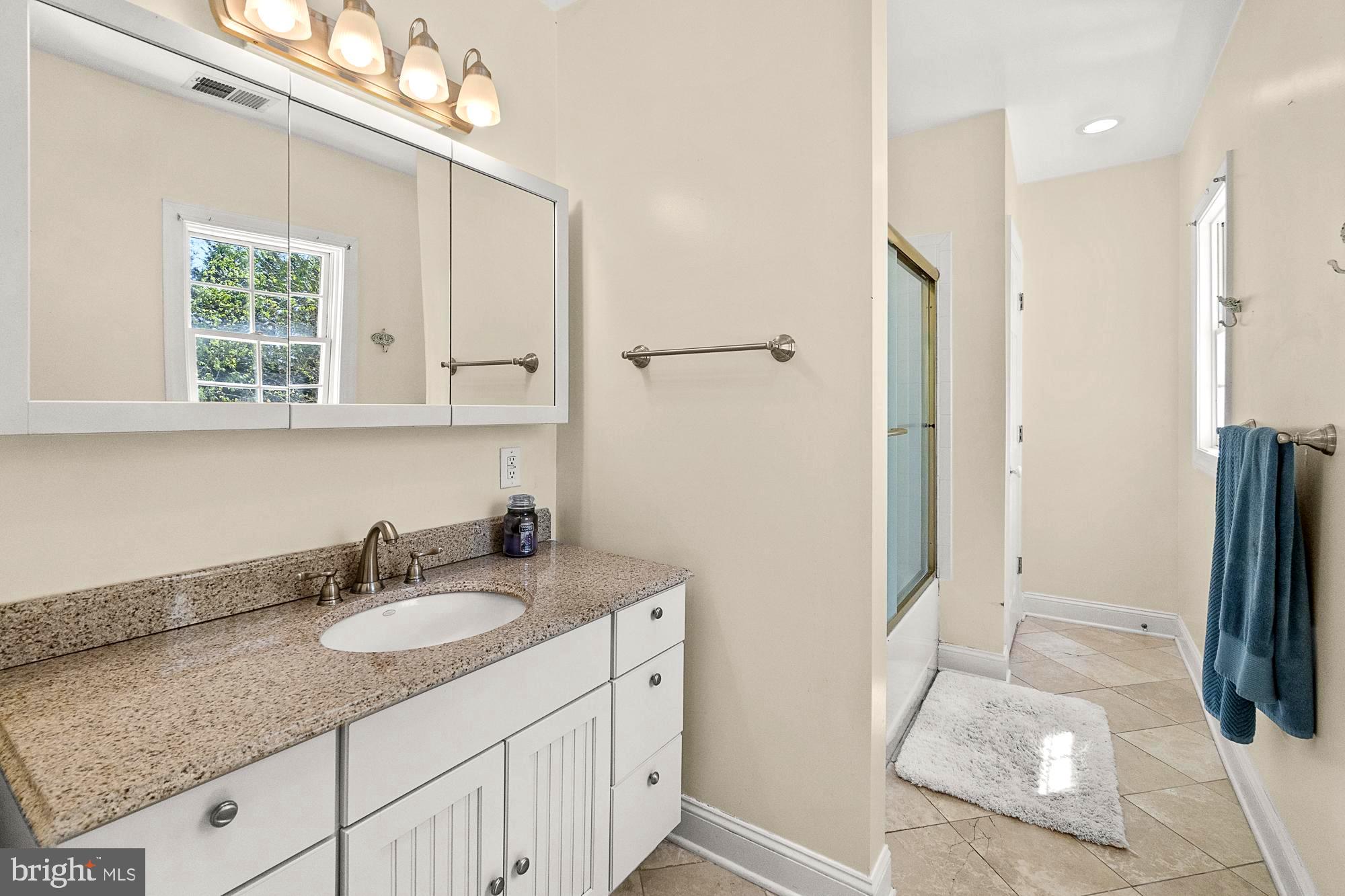 17811 Elgin Road Poolesville, MD 20837 - Photo 57 of 91 Primary bath with ceramic counters and tile floor