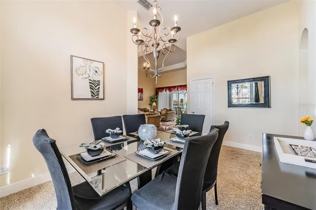 a view of a dining room with furniture