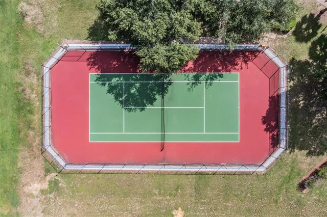 an aerial view of a city with ocean view