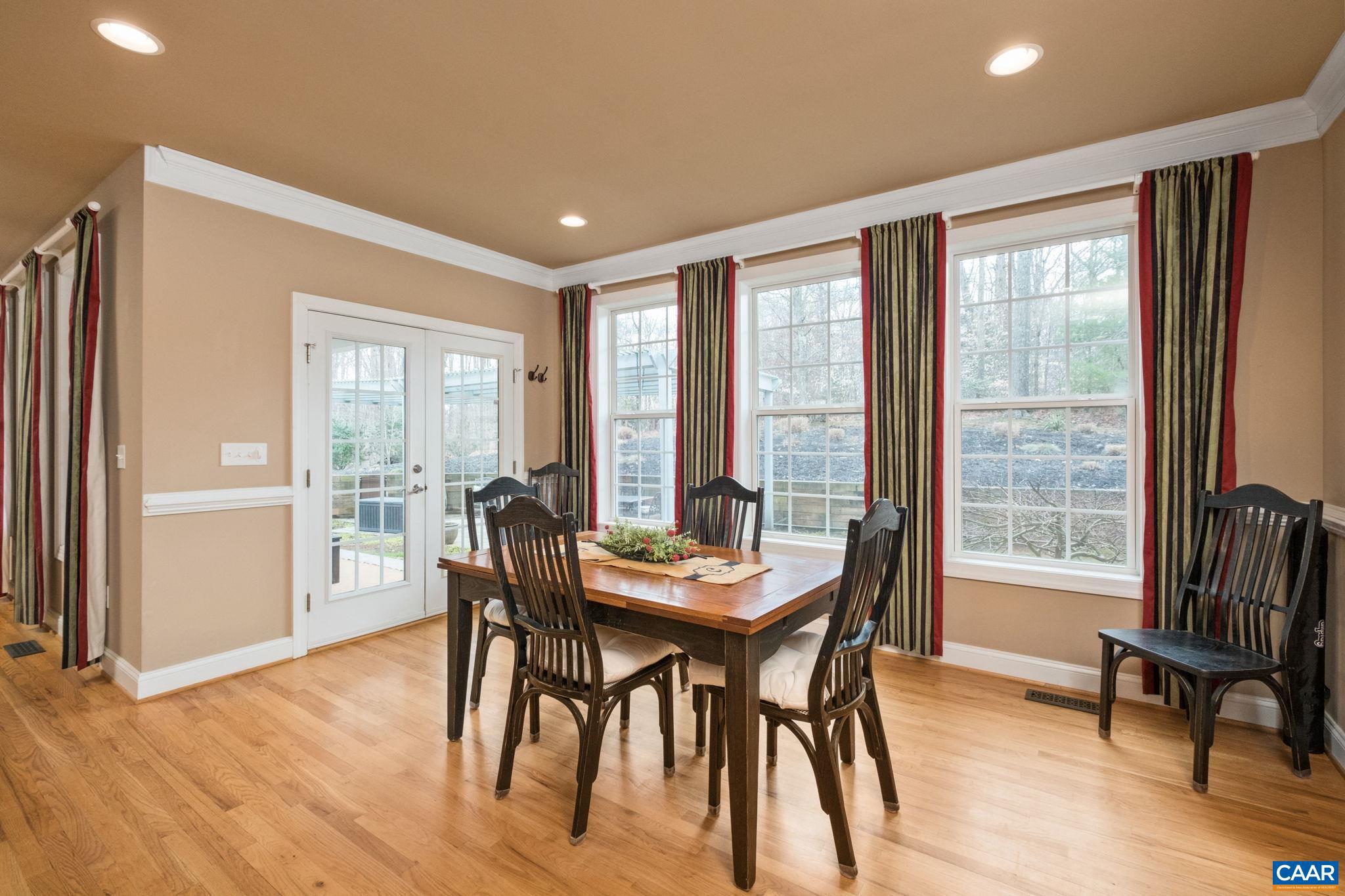 612 London Court Ruckersville, VA 22968 - Photo 12 of 55 a dining room with furniture window wooden floor