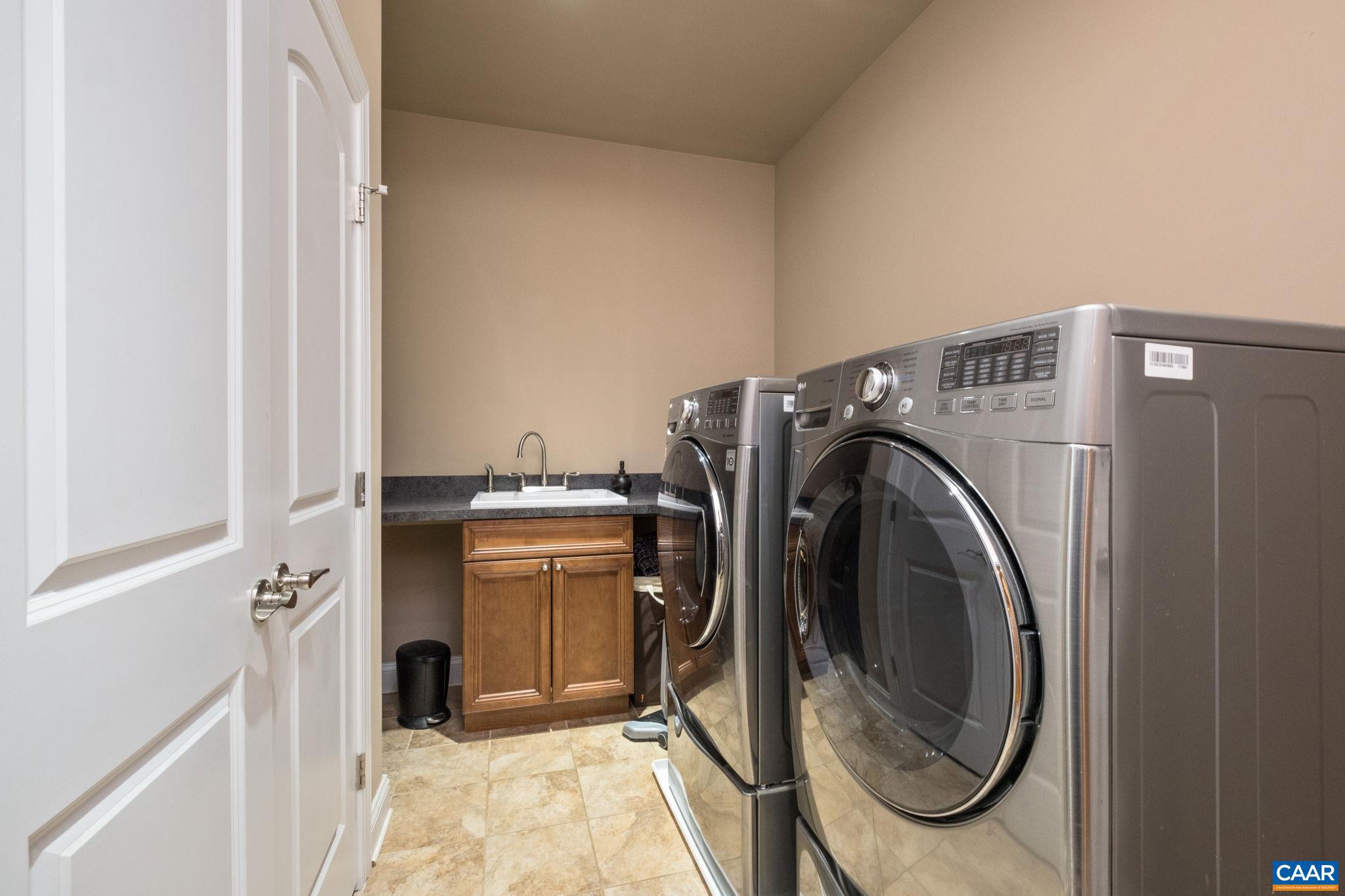 612 London Court Ruckersville, VA 22968 - Photo 21 of 55 a view of a storage & utility room with washer and dryer