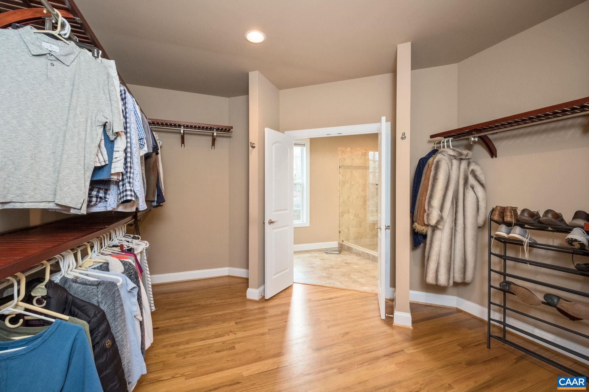 612 London Court Ruckersville, VA 22968 - Photo 25 of 55 a view of walk in closet with clothes and shoes