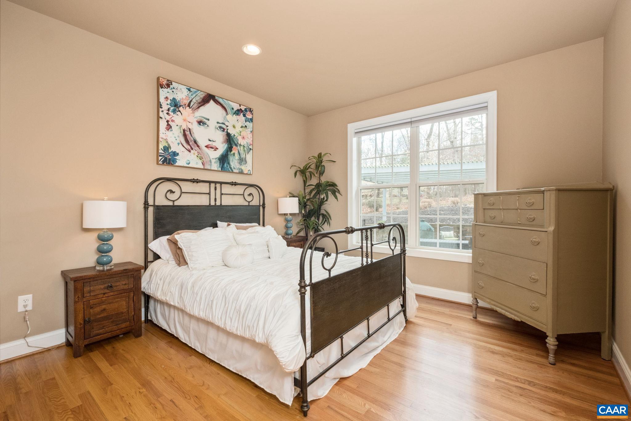 612 London Court Ruckersville, VA 22968 - Photo 35 of 55 a bedroom with a bed and a window