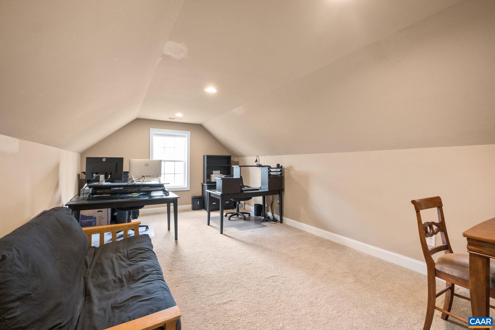 612 London Court Ruckersville, VA 22968 - Photo 37 of 55 a living room with furniture and a dining table with kitchen view