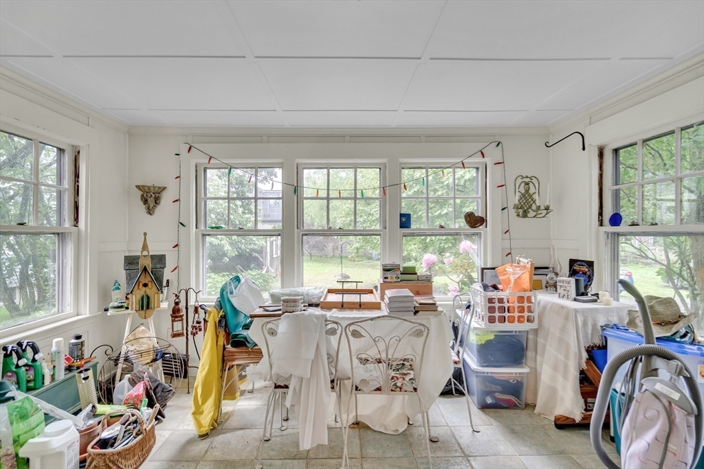 95 Cushing Street Cambridge, MA 02138 - Photo 12 of 21 a living room with furniture and a large window