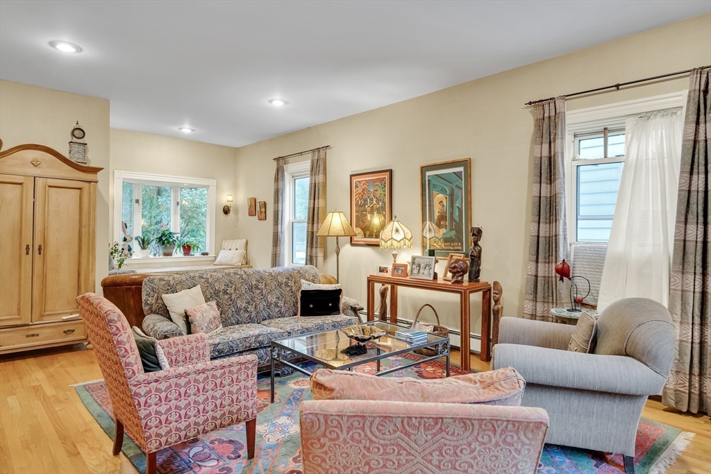 95 Cushing Street Cambridge, MA 02138 - Photo 7 of 21 a living room with furniture and a large window