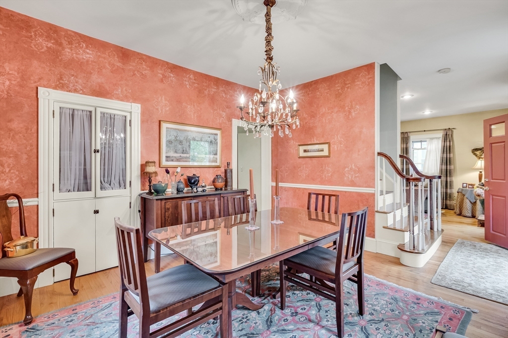 95 Cushing Street Cambridge, MA 02138 - Photo 8 of 21 a view of a dining room with furniture and wooden floor
