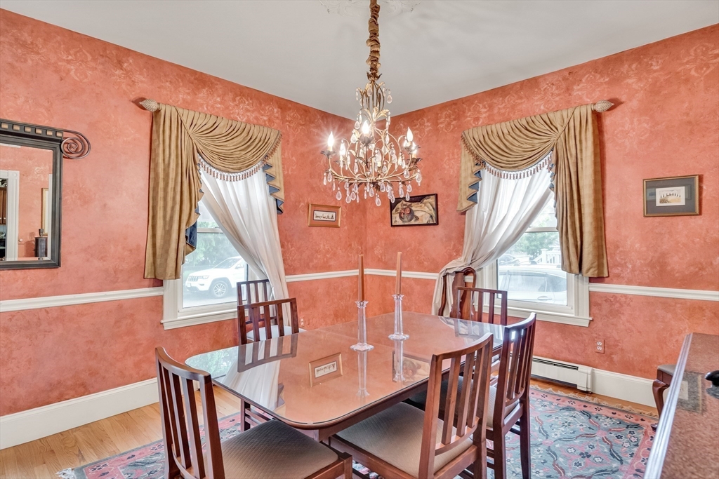 95 Cushing Street Cambridge, MA 02138 - Photo 9 of 21 a view of a dining room with furniture window and wooden floor