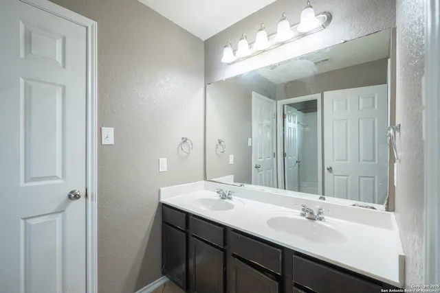 a bathroom with a toilet and a bathtub