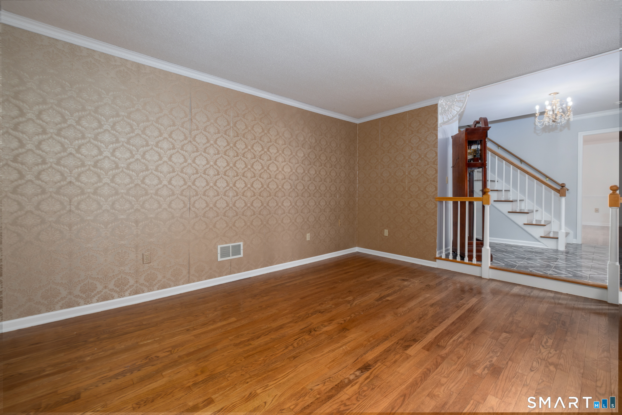 90 Fenn Road Middlebury, CT 06762 - Photo 5 of 34 Sunken living room open to foyer.
