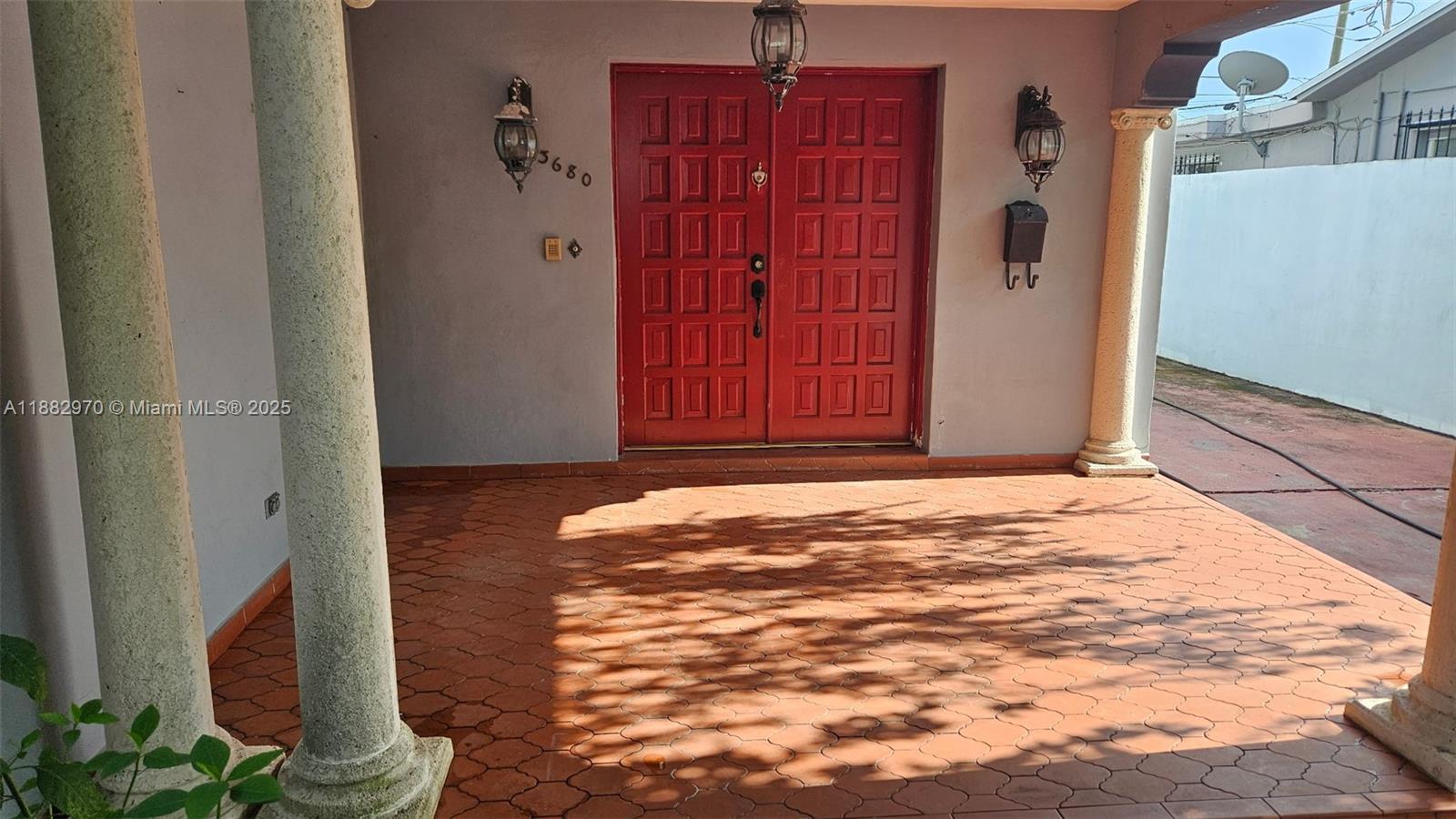 3680 Northwest 16th Street Miami, FL 33125 - Photo 3 of 45 a view of front door of house