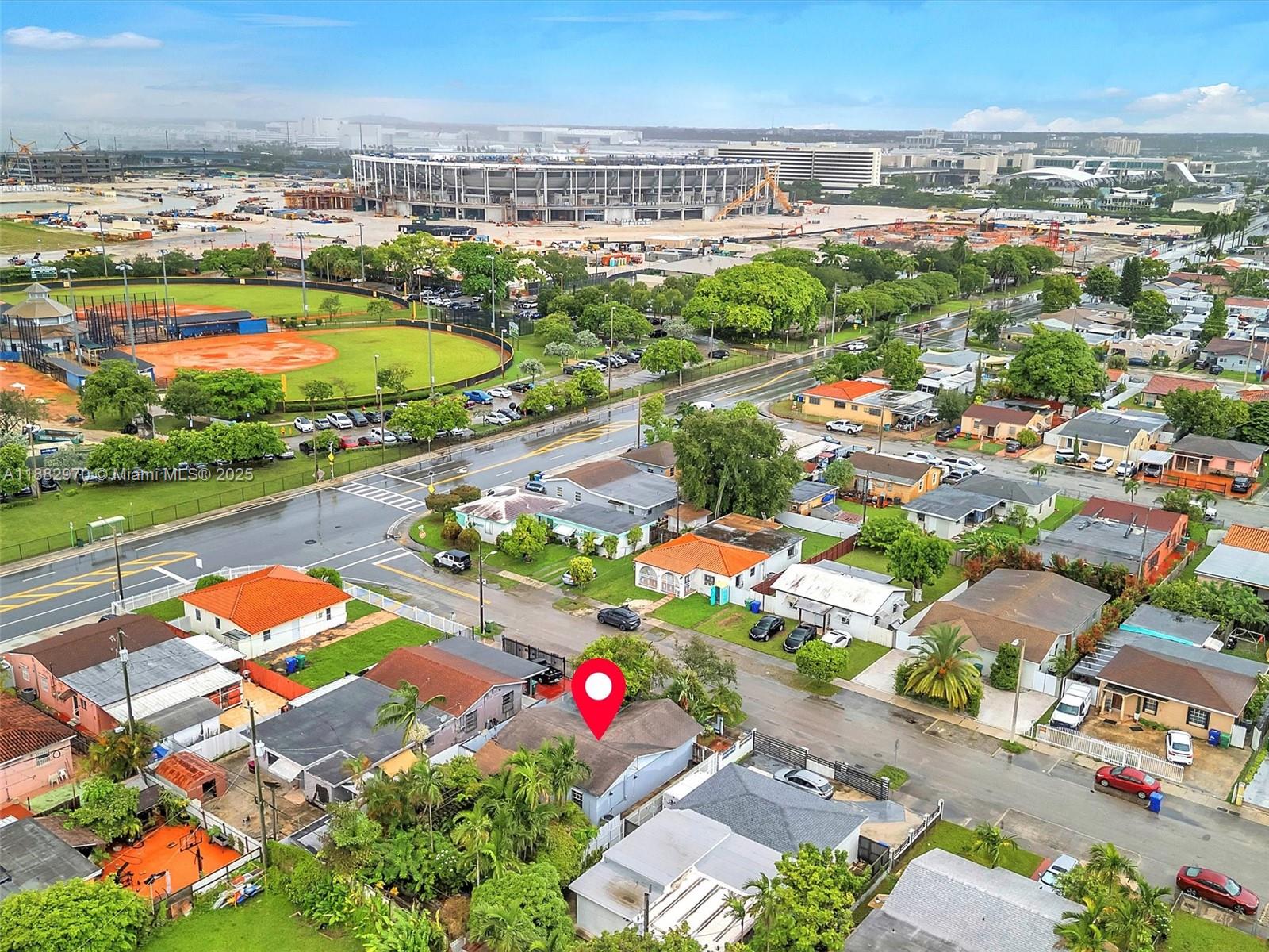 3680 Northwest 16th Street Miami, FL 33125 - Photo 36 of 45 an aerial view of a houses and an outdoor space