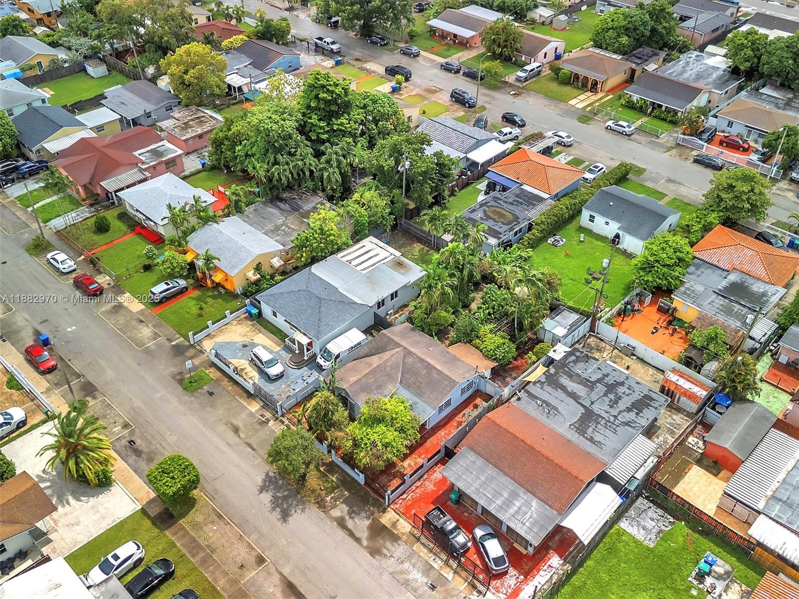 3680 Northwest 16th Street Miami, FL 33125 - Photo 42 of 45 an aerial view of residential building and swimming pool