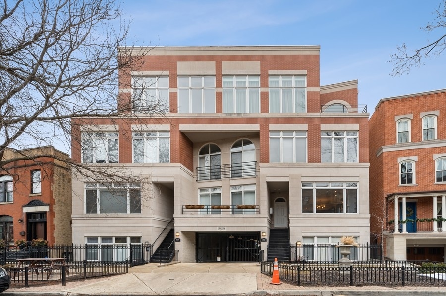 2919 North Burling Street, Unit D Chicago, IL 60657 - Photo 1 of 14 a front view of a multi story building