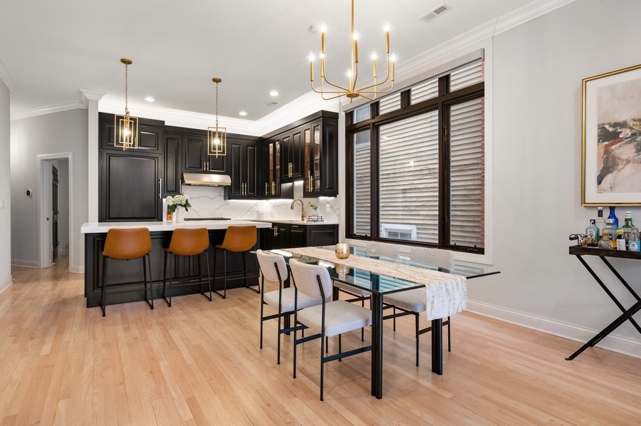 2919 North Burling Street, Unit D Chicago, IL 60657 - Photo 4 of 14 a outdoor space with a large window and stainless steel appliances