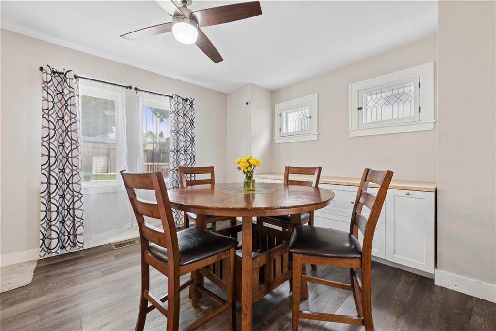 53 Calhoun Avenue Pittsburgh, PA 15210 - Photo 7 of 30 a view of a dining room with furniture and wooden floor