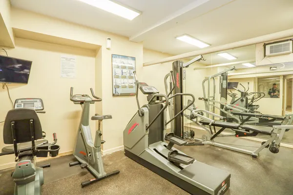 a view of a room with gym equipment