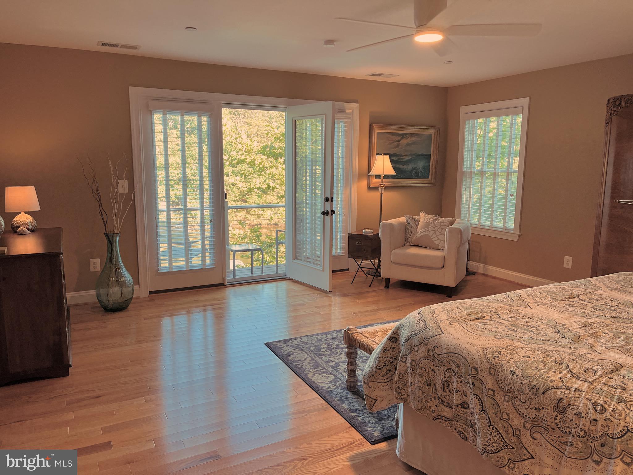 186 Acton Road Annapolis, MD 21403 - Photo 16 of 19 Main bedroom with balcony and view of Spa Creek