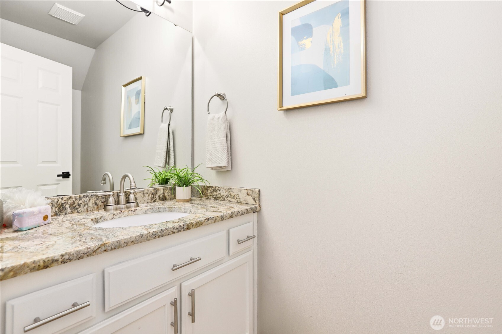23327 8th Place West Bothell, WA 98021 - Photo 16 of 40 a bathroom with a granite countertop sink and a mirror