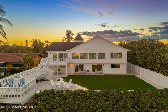 a spacious bedroom with a bed and a walk in closet