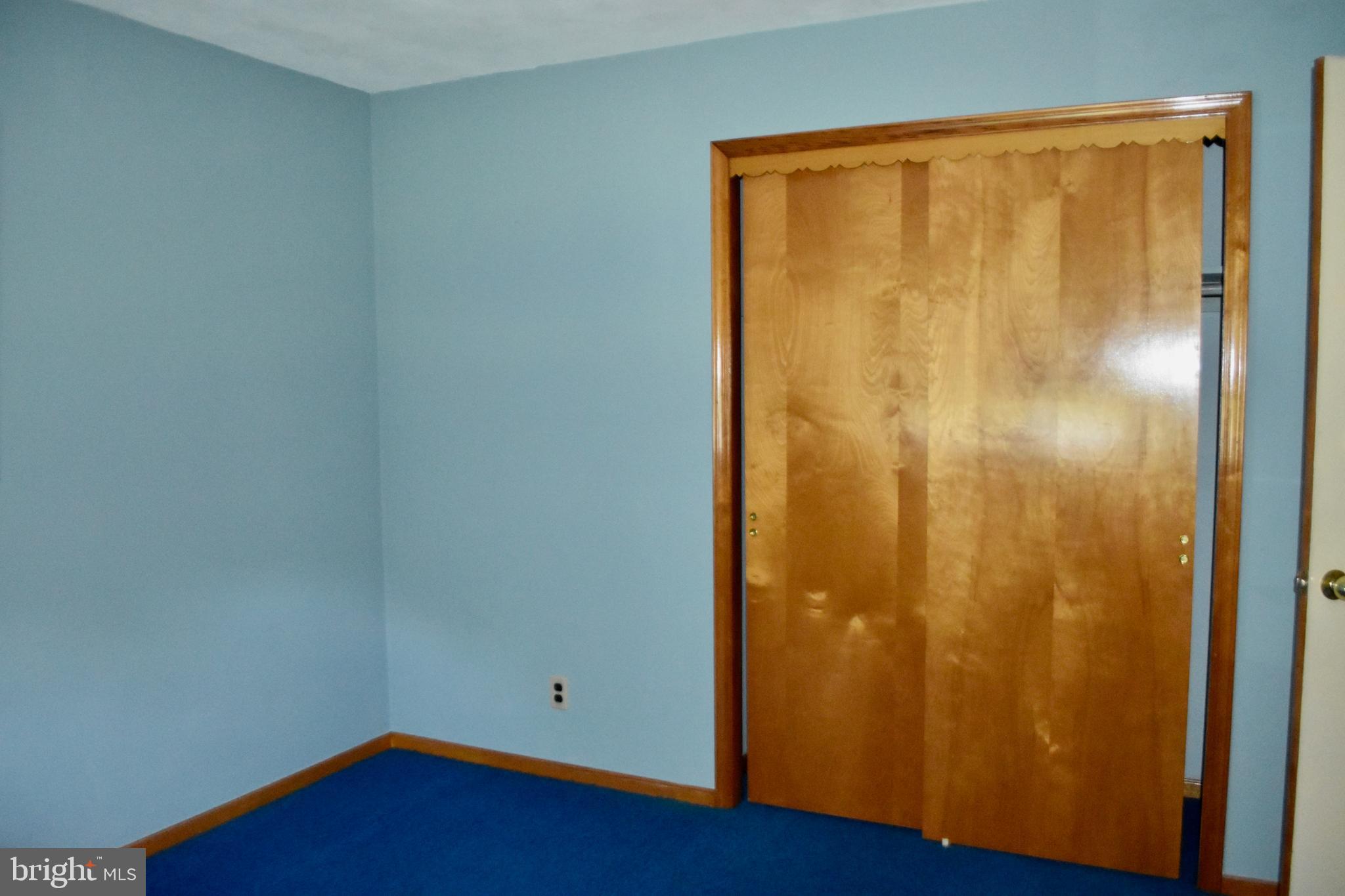 509 Walker Avenue Ewing, NJ 08628 - Photo 11 of 20 a view of an empty room with wooden floor and shower