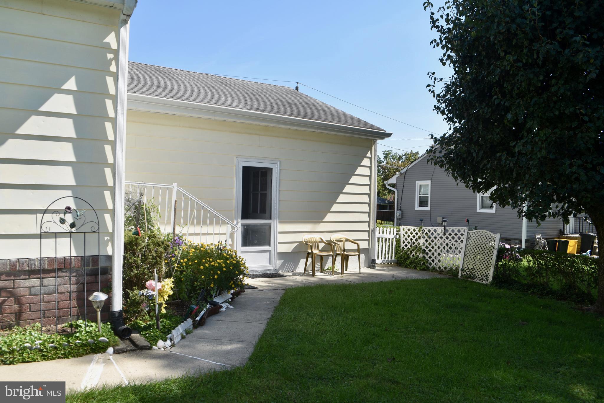 509 Walker Avenue Ewing, NJ 08628 - Photo 20 of 20 a front view of a house with garden