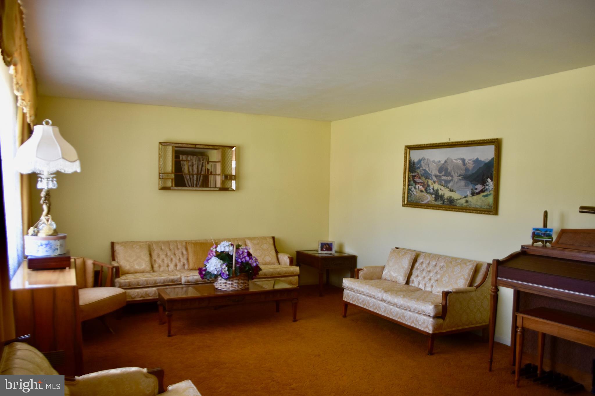 509 Walker Avenue Ewing, NJ 08628 - Photo 2 of 20 a living room with furniture and a couch