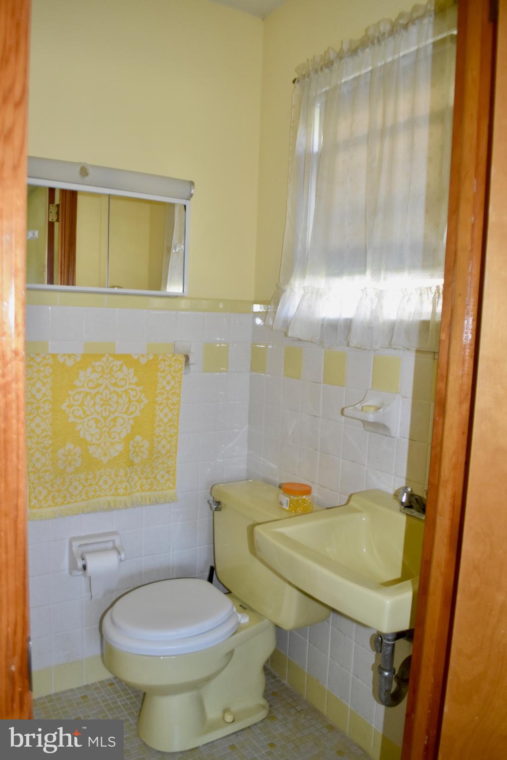 509 Walker Avenue Ewing, NJ 08628 - Photo 9 of 20 a bathroom with a sink toilet and shower