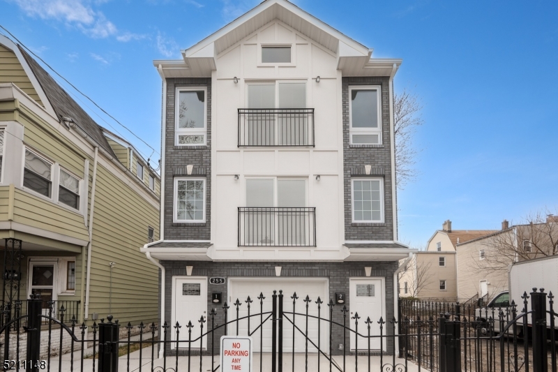 255 Chadwick Avenue, Unit 2 Newark, NJ 07108 - Photo 21 of 23 a front view of a house with a window