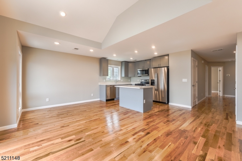 255 Chadwick Avenue, Unit 2 Newark, NJ 07108 - Photo 7 of 23 a view of kitchen with wooden floor