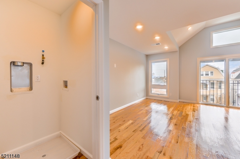 255 Chadwick Avenue, Unit 2 Newark, NJ 07108 - Photo 9 of 23 a view of an empty room and window