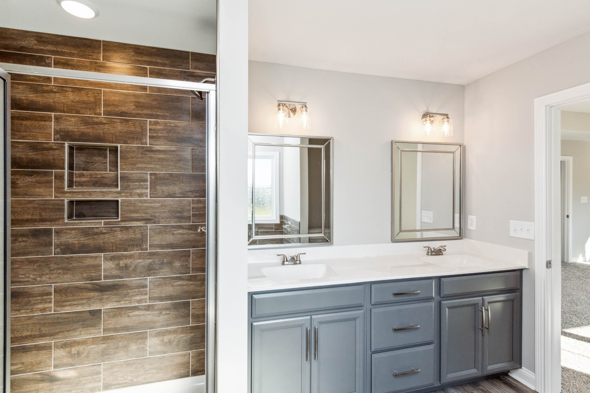 584 Lafayette Road Clarksville, TN 37042 - Photo 18 of 36 a bathroom with a double vanity sink mirror and