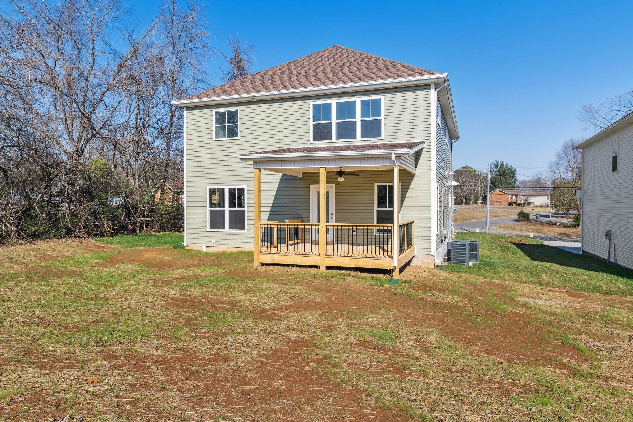 584 Lafayette Road Clarksville, TN 37042 - Photo 35 of 36 a view of a house with backyard porch and brick wall
