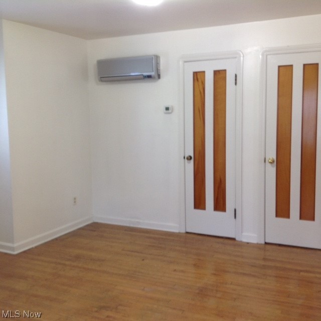 4601 Grayton Road Cleveland, OH 44135 - Photo 15 of 31 Bedroom with hardwood floor, dual closest and porch